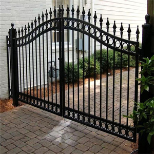 Black arched double entrance gate with decorative finials