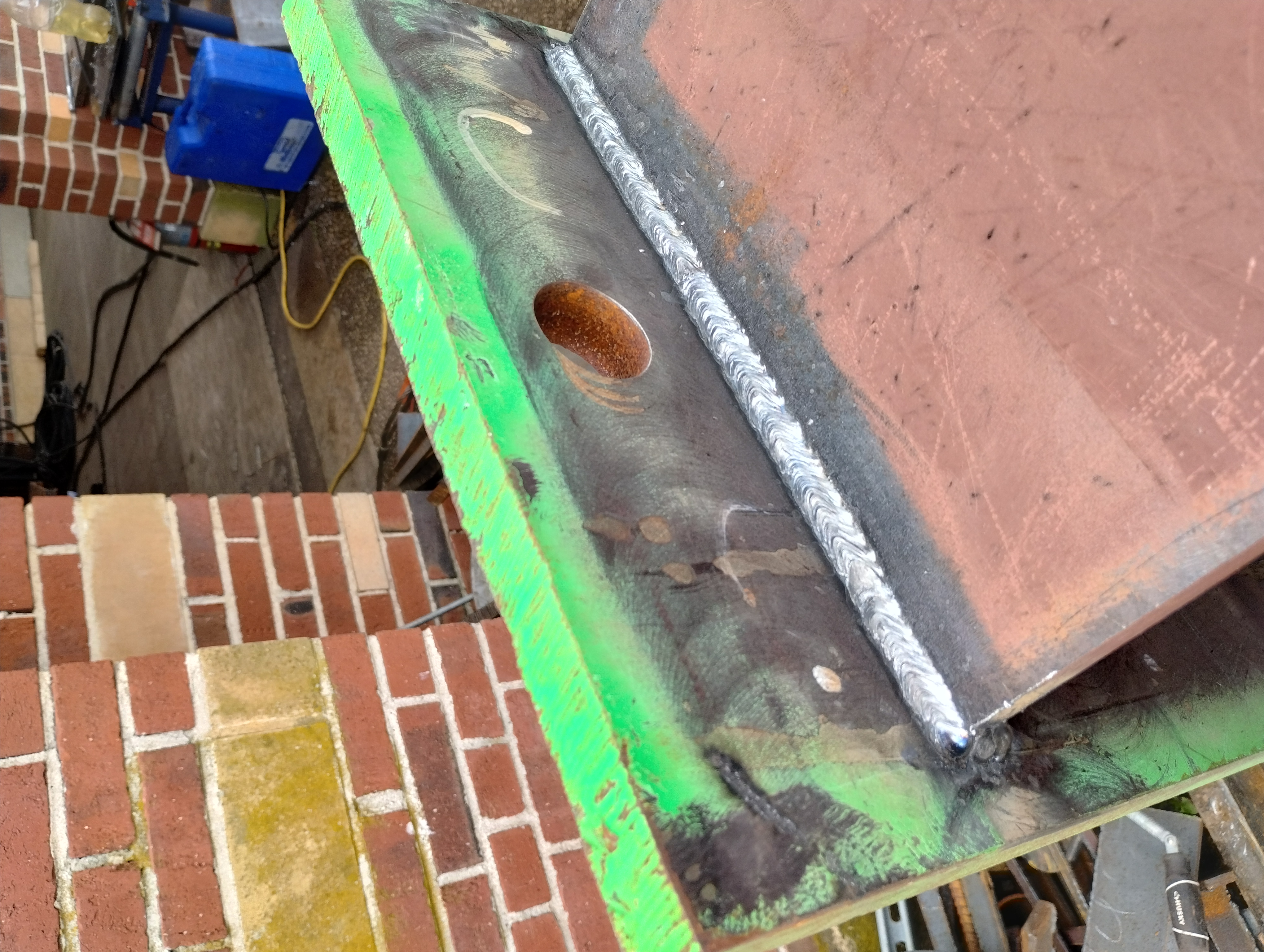 Close-up of a weld joining steel plates